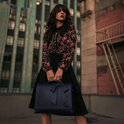 Elena's elegant bow bag